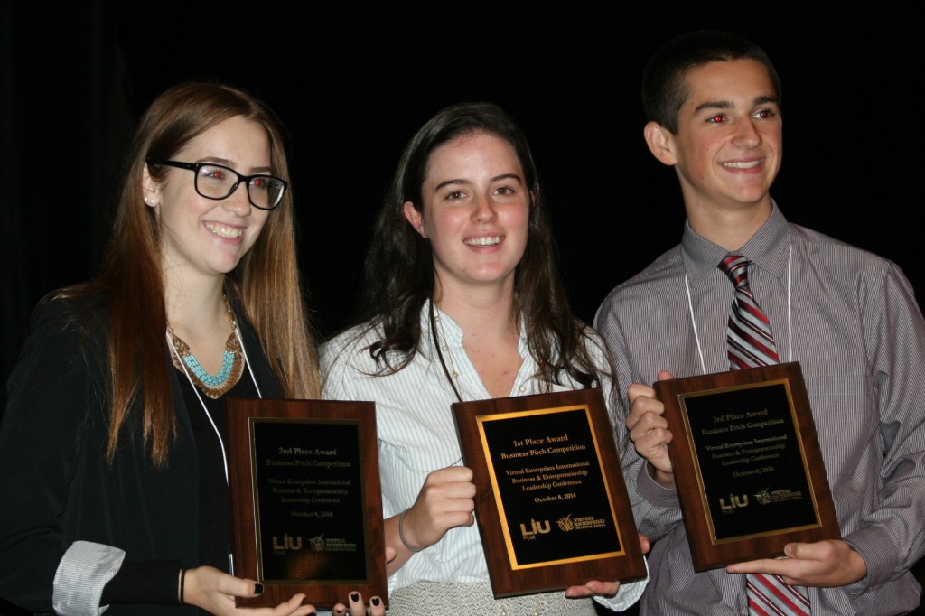 Students who delivered the top pitches (from left to right) Fressia, Lisa, and William